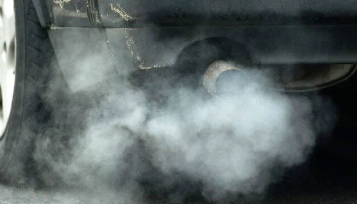 This representational image shows a vehicle emitting smoke. — Reuters/File