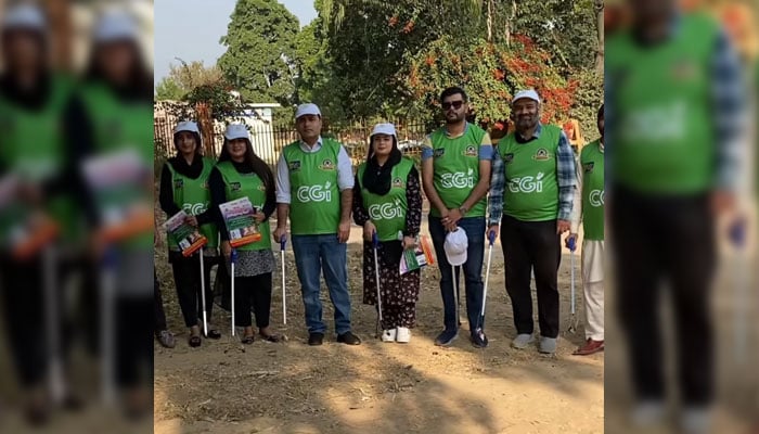 Chairman of the CGI Movement, Ahsan Zafar Bakhtawari (3rd left) poses for a photo with his team during a proactive cleanliness drive in the parks of Islamabad on December 1, 2024. — Screengrab via Facebook@ahsan.bakhtawari.71