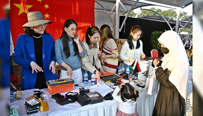 Women visit stalls at the Pakistan Foreign Office Womens Association (PFOWA) Annual Charity Bazaar 2024, in collaboration with the Diplomatic Corps at the Ministry of Foreign Affairs on December 1, 2024. — APP