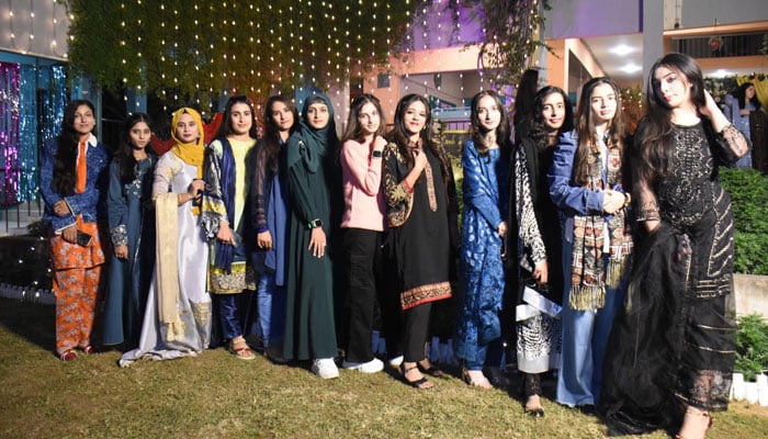 Students pose for a group photo during the Alumni Evening of Model College for Girls G10/4 on December 1, 2024. — INP