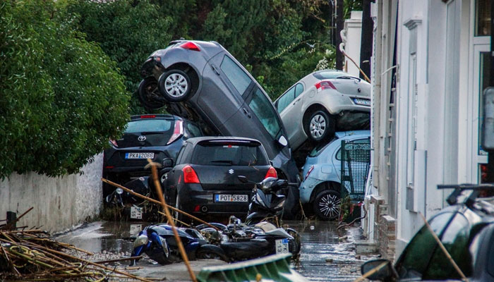 Cars piled on top of each other in the city of Rhodes after heavy rainfall, on the Greek island of Rhodes, on December 1, 2024. — AFP