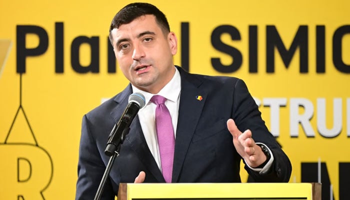 Presidential candidate and leader of the far-right Alliance for the Unity of Romanians AUR party, George Simion, addresses a press conference at his partys headquarters in Bucharest on November 20, 2024.— AFP