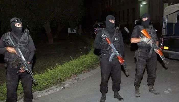 Counter Terrorism Department (CTD) officials stand guard in this undated image. — State Media/File