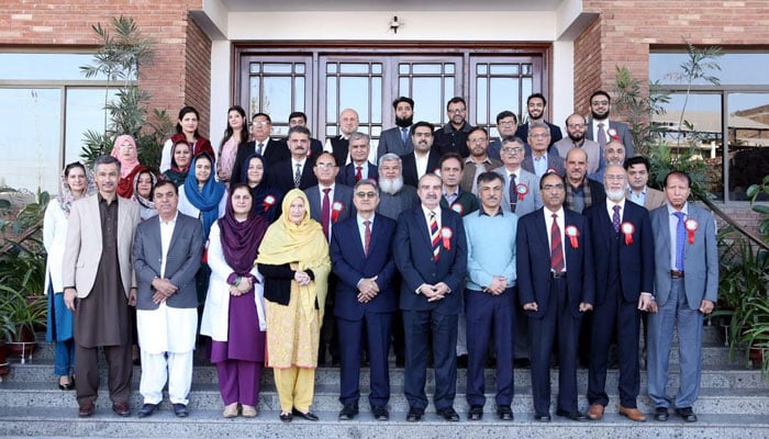 Participants pose for a group photo at a two-day international conference hosted by Gandhara University on December 2, 2024. — Facebook@Gandhara.University.Peshawar