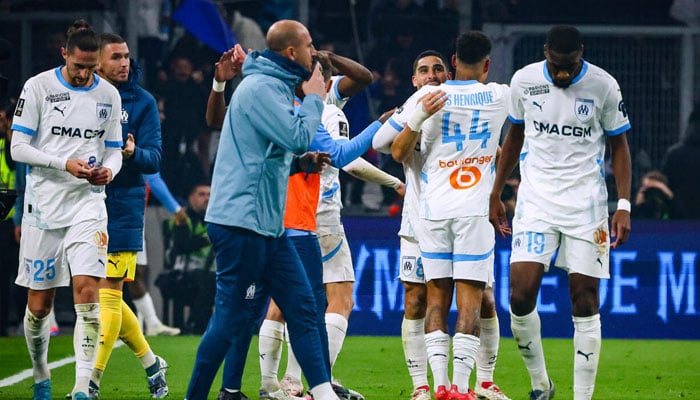 Marseille celebrate their equaliser against Monaco. — AFP/File