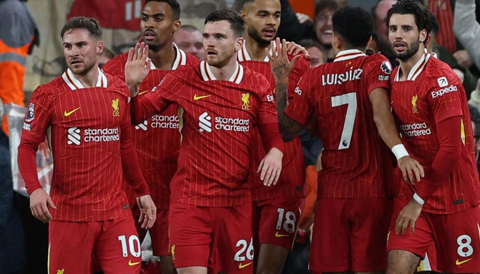 Liverpool celebrating after winning. — AFP/File