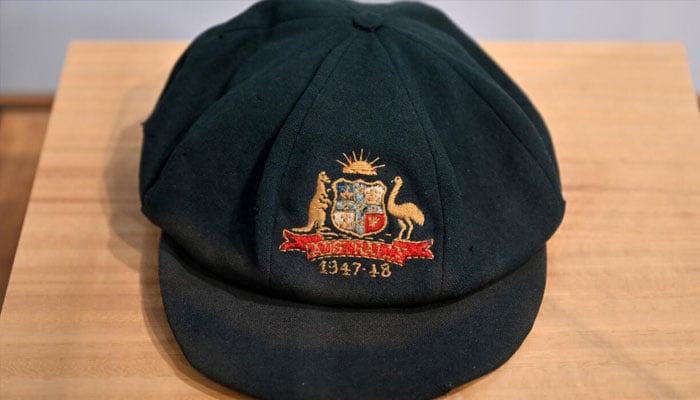 A baggy green cap worn by Australia cricket legend Don Bradman . — AFP/File