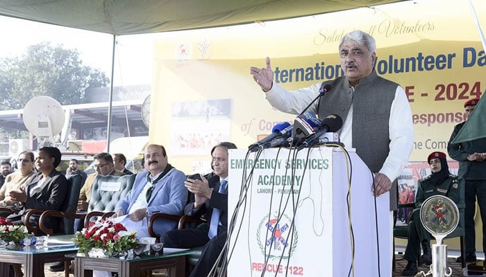 Punjab Health Minister Khawaja Salman Rafique addresses the International Volunteer Day 2024 ceremony at the Emergency Services Academy on December 2, 2024. — Facebook@SalmanRafiquePK