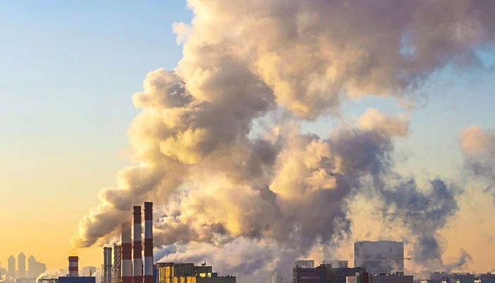 A representational image showing dense smoke being emitted from a factory. — AFP/File