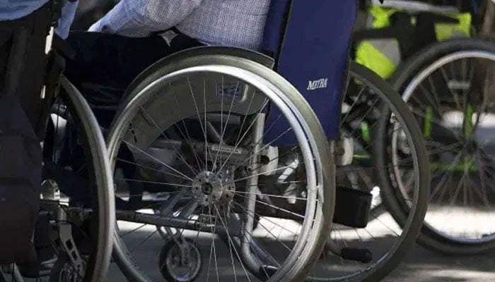 A representational image showing a person sitting on a wheelchair. — AFP/File