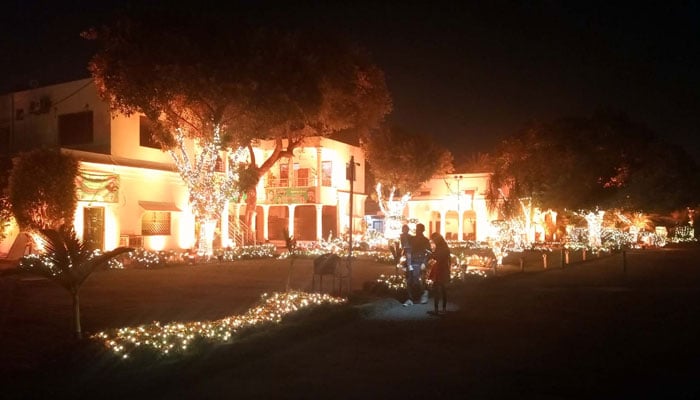 Beautiful illuminated view of The Parks and Horticulture Authority (PHA) Building decorated with lights, at Racecourse Park in Lahore on December 3, 2024. — PPI