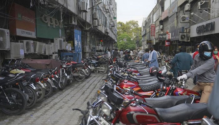 A representational image of motorcycles parked at a parking area. — AFP/File