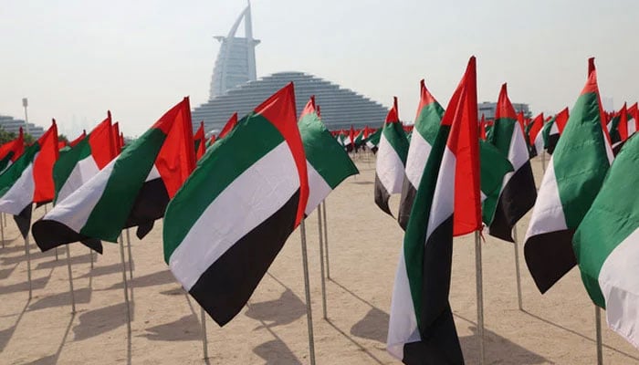 UAE flags can be seen in this image. — AFP/File