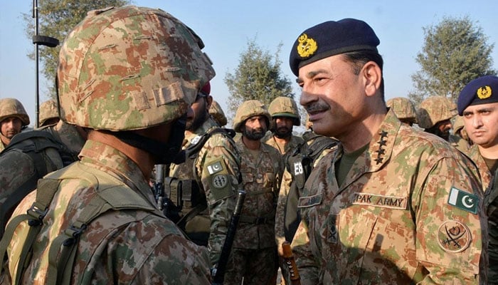 Chief of the Army Staff (COAS) General Syed Asim Munir meeting soldiers during his visit of a field training exercise near Narowal and Sialkot on December 3, 2024. — Facebook@ISPROfficial1