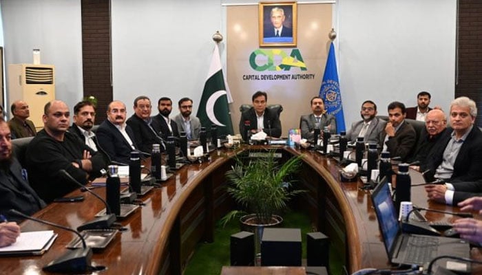 Chairman Capital Development Authority (CDA), Muhammad Ali Randhawa (centre)chairing a meeting on Tuesday December 3, 2024 with a delegation of investors here to discuss the upcoming open auction of prime hotel plots in Islamabad. — APP