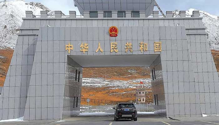 ٓٓ ٓA car crosses the Pakistan-China Khunjerab Pass. —AFP/File