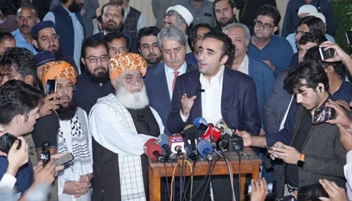 JUI-F Chief Maulana Fazlur Rehman (centre-left) and PPP Chairman Bilawal Bhutto-Zardari address a joint press conference outside the formers residence on October 20, 2024. — X@MediaCellPPP