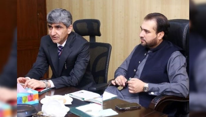 Minister for Agriculture and Livestock Syed Ashiq Hussain Kirmani (right) sits in a meeting at the Agriculture House on December 4, 2024. — Facebook@Syed.Ashiq.Kirmani