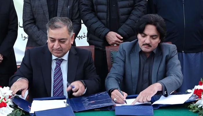 MOU signing ceremony between the Housing Department and the Bank of Khyber at the Chief Minister’s House on December 4, 2024. — Screengrab via Facebook@AliAminKhanGandapurPti