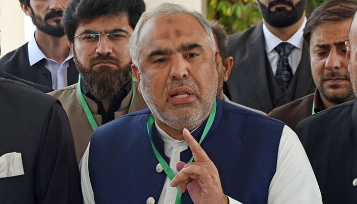 Senior leader of PTI Asad Qaiser talking to media outside the Supreme Court in Islamabad. — Online/File