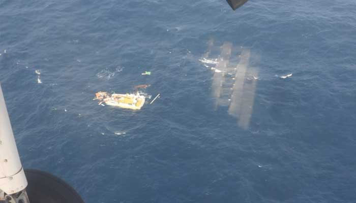 Photo taken on December 4, 2024 shows Indians on life raft after their cargo vessel MSV AL PIRANIPIR sinks in Pakistans exclusive economic zone. — X@PMSAHQ