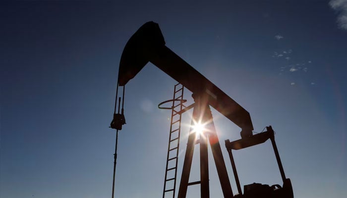 The sun is seen behind a crude oil pump jack in the Permian Basin in Loving County, Texas, US, November 22, 2019. — Reuters