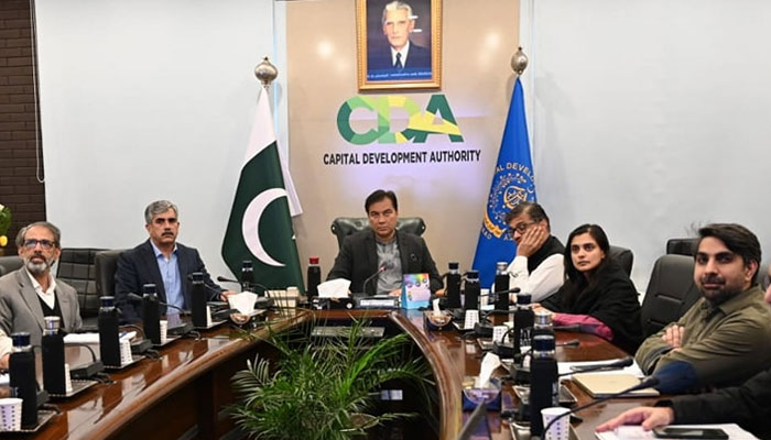 Capital Development Authority (CDA) Chairman, Muhammad Ali Randhawa (centre) presides over a meeting at CDA Headquarters on December 5, 2024. — Facebook@cda.isb.pk