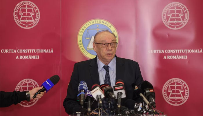 Head of the Romanian Constitutional Court Marian Enache announces the validation of the countrys presidential election first-round result, following a vote recount, in Bucharest, Romania, December 2, 2024. — Reuters