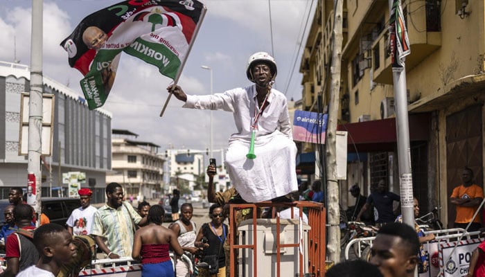 Ghanas Mahamas supporters celebrating in the streets. — AFP/File