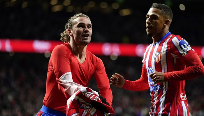 Atletico Madrids Antoine Griezmann (right) celebrates scoring their fourth goal. — Reuters/File