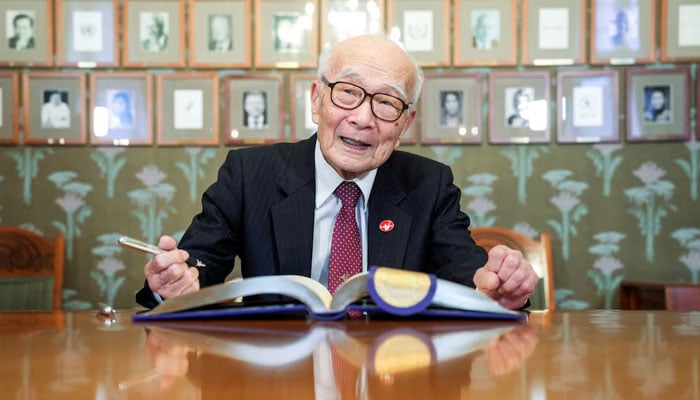 Terumi Tanaka, the representative of 2024 Nobel Peace Prize winner Nihon Hidankyo, signs the guest book at the Nobel Institute in Oslo, Norway December 9, 2024. — Reuters