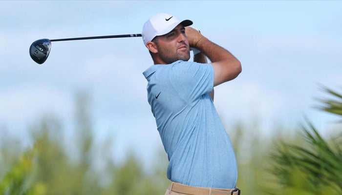 Top-ranked Scottie Scheffler in position after hitting a shot. — AFP/File