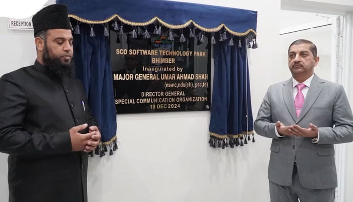 Director General SCO Major General Umar Ahmad Shah, HI (M) (right) unveils the SCO 6th Software Technology Park (STP) in Bhimber (AJK) on December 11, 201245. — Screengrab via Facebook@officialHQSCO