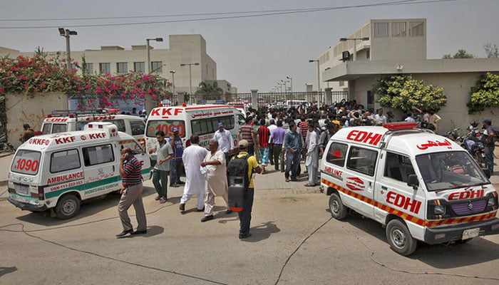 This representational image shows ambulances and people gathering outside the hospital in Karachi, Pakistan. — Reuters/File