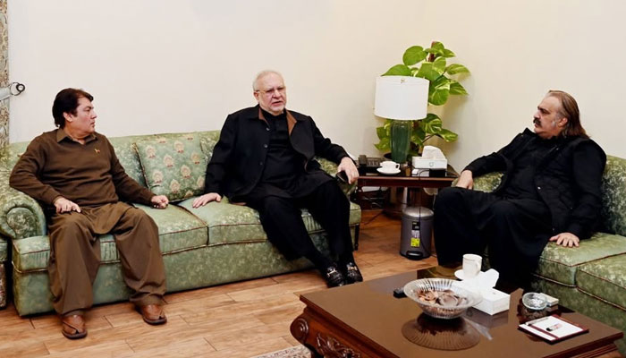 Khyber Pakhtunkhwa (KP) Chief Minister Ali Amin Gandapur (right) met with former federal minister and senator Muhammad Ali Durrani (centre), adviser to CM of Khyber Pakhtunkhwa for Information Barrister Muhammad Ali Saif is also present in the meeting on December 12, 2024. — Facebook@AliAminKhanGandapurPti