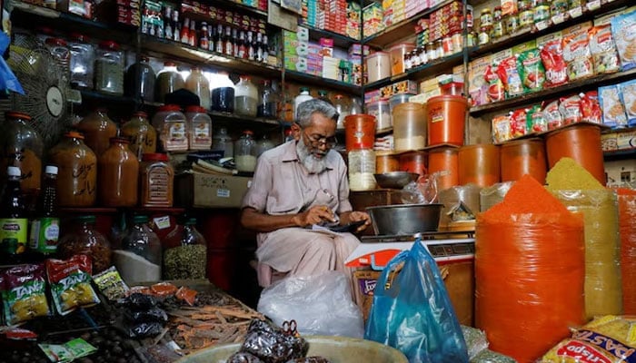 A shopkeeper seen in this undated image. — APP/File