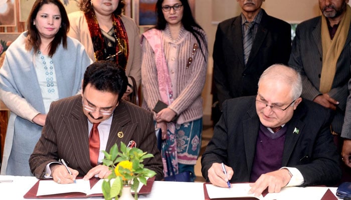 This image taken on December 13, 2024, shows GCU Vice Chancellor Prof Dr Muhammad Ali (left) and CSA Director General Farhan Aziz Khawaja (right) signing an MOU during a signing ceremony between  GCU and the CSA. — Facebook@ProfDrMuhammadAliOfficialPage