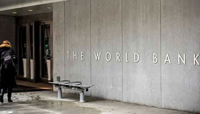 A person enters the building of the Washington-based global development lender, The World Bank Group, in Washington. — AFP/File