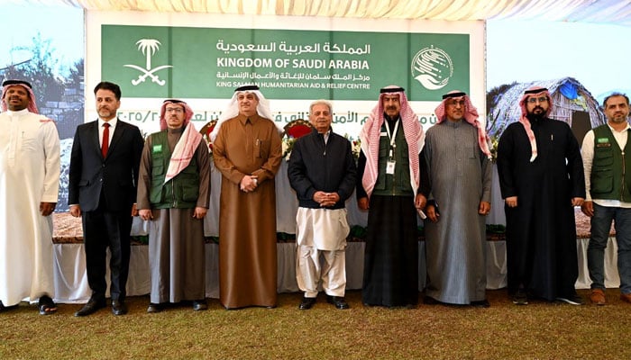 Federal Minister for National Food Security & Research, Rana Tanveer Hussain (centre) and Ambassador of Saudi Arabia in Pakistan H.E. Nawaf Saeed Al-Malikey (4th left) in a group photograph with other participants during (KSrelief) Launches Food Security Support Project in Pakistan to Benefit over 1 Million Individuals at Saudi Arabian Embassy on December 13, 2024. — APP