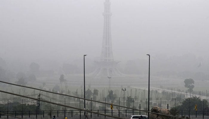 Minar-e-Pakistan is seen engulfed in smog in Lahore on November 13, 2024. — AFP