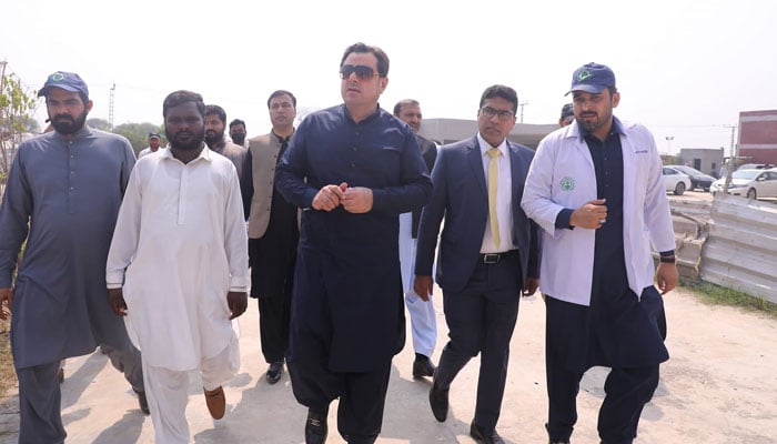 Punjab Minister for Housing and Urban Development Bilal Yasin (centre) .— Facebook@bilalyaseen120/File