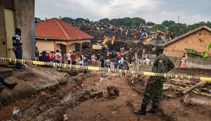 A Do not cross tape can be seen on a landsliding site in Uganda. — AFP/File