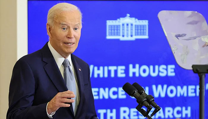 US President Joe Biden speaks during the first-ever White House Conference on Womens Health Research, in the East Room of the White House in Washington, DC, on December 11, 2024. — AFP