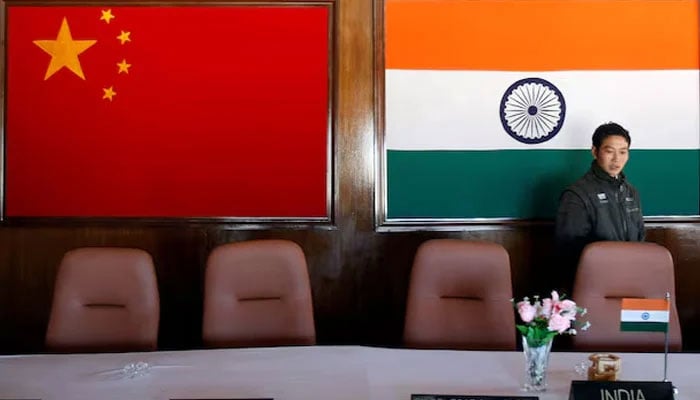 A man walks inside a conference room used for meetings between military commanders of China and India, at the Indian side of the Indo-China border at Bumla, in the northeastern Indian state of Arunachal Pradesh, photo taken on  November 11, 2009. — Reuters