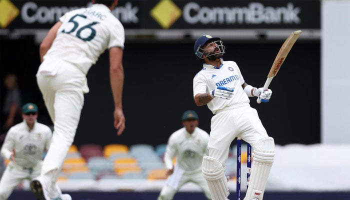 Indias Virat Kohli (right) faces a bouncer from Australias Mitchell Starc. — AFP/File