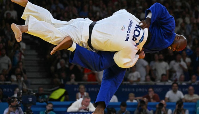 Frances Teddy Riner (right) in action at the Paris Olympics. —AFP/File