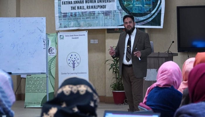 A participant delivers a lecture on the growing need for market-aligned education, the Quality Enhancement Cell (QEC) and the Centre for Learning Excellence (CLE) at FJWU on December 16, 2024. — Facebook@Fjwu_Official