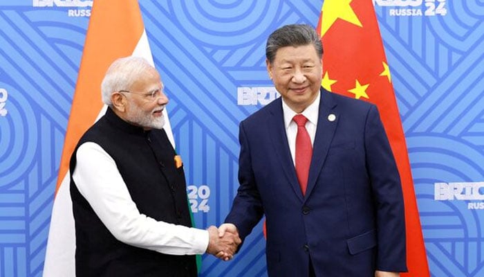 Chinese President Xi Jinping and India Prime Minister Narendra Modi meet on the sidelines of the BRICS summit in Kazan, Russia October 23, 2024. — Reuters