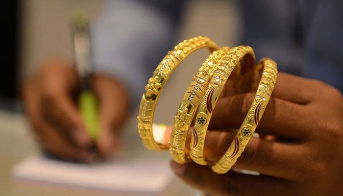 This undated file image shows a set of gold bangles. — AFP/File