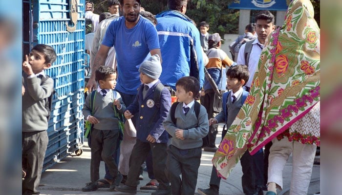 Students going home after attending their class at a school in Punjab on November 19, 2024. — Online